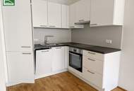 Eigengarten mitten in der Stadt! Hofseitige 2-Zimmer-Wohnung mit toller Ausstattung