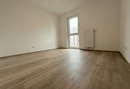 Erstbezug "ein viertel grün" – stilvolle 3-Zimmer-Wohnung mit Balkon