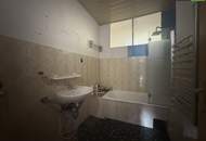 Sanierungsbedürftige Eigentumswohnung in St. Peter-Freienstein mit 4 Zimmern und Balkon