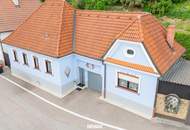 Gemütliches Einfamilienhaus mit grünem Innenhof, separatem Arbeitsbereich und Nebengebäude