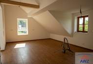 Wunderschöne neue Obergeschoss-Wohnung mit Eigengarten zu verkaufen!