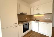 Kompakte + günstige Neubauwohnung mit MEGA-SÜD-LOGGIA (11,70m²) nahe Akademiepark