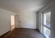 Barrierefreie 4-Zimmer-Neubauwohnung mit Lift, großem Keller und 2 PKW-Stellplätzen in ruhiger Lage