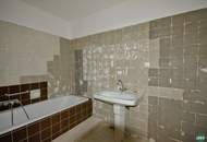 Sanierungsbedürftige Eigentumswohnung mit großzügiger Terrasse