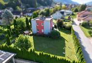 DREI SEEN. EIN ZUHAUSE. – Modernes Wolf Haus mit Garten und Vollkeller in Feld am See