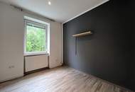 Moderne, sanierte 3-Zimmer-Eigentumswohnung mit Gartenanteil und Garage