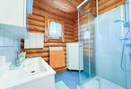 Chalet-Feeling mitten in Donaufeld - Naturstamm-Blockhaus mit Sauna, Kamin und Garten