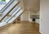Moderne 2-Zimmer Dachgeschosswohnung mit Klimaanlage, Einbauküche und Terrasse - ab 15.04. beziehbar!