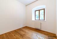 Charmante 2,5-Zimmer-Wohnung mit gemütlichem Eigengarten im Palais Löwenfeld ab sofort zu vermieten!