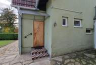 Vielseitiges Mehrfamilienhaus mit Charme und einladendem Garten