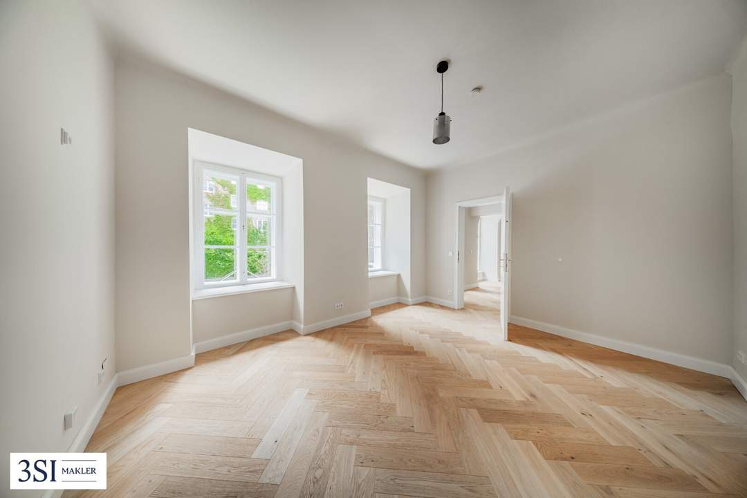 Wohnen beim Schloss Belvedere: Erstbezug mit Blick in den begrünten Innenhof
