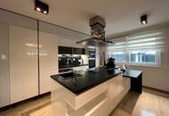 Moderner Wohntraum mit Wintergarten und Pool