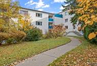 Charmante Ruheoase mit perfekter Anbindung I Loggia mit Blick ins Grüne I Mauer