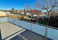 ERSTBEZUG! Geräumige Eigentumswohnung im Obergeschoss mit Balkon und größer Dachterrasse
