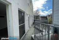 Downtown-Flair: tolle Maisonette mit 2 Terrassen und Garage