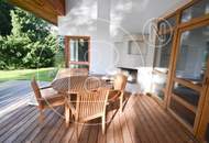 Einfamilienhaus in zentraler Bestlage mit Tennisplatz auf parkähnlichem Grund!