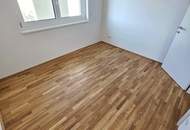 Durchdacht geplant, hochwertig umgesetzt! Happy to be here! Klimaaktiv Bronze / Kompakt / 3 Zimmer / Großer Süd-Balkon! TOP Neubauprojekt im Grünen + Perfekte Raumaufteilung + Luftwärmepumpe und Solaranlage + Garage!