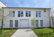 Zeitlose Architektur trifft Großzügigkeit - Designvilla mit Indoor-Pool und Einliegeroption