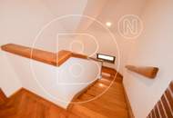 Einfamilienhaus in zentraler Bestlage mit Tennisplatz auf parkähnlichem Grund!