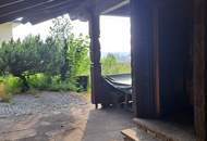 Schörfling am Attersee: Holzblockhaus-Ferienhaus auf Baugrundstück in erhabener Lage über dem Attersee!