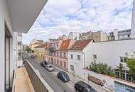 KOMPAKTE 2-ZIMMER WOHNUNG MIT GESIMSE UND BLUMENTRÖGEN