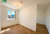Hochwertiger Erstbezug direkt an der Donau - Großer Balkon und Schrankraum!
