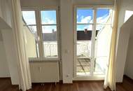 Ruhige 2-Zimmer Wohnung mit Grünblick, Terrasse + 2 Garagenplätzen