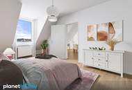 Lichtdurchflutete Dachgeschosswohnung mit traumhaftem Weitblick