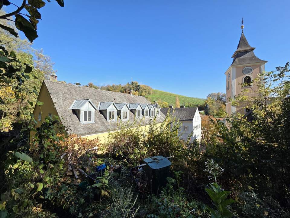 Tolle Eigentumswohnung im Dachgeschoß in sehr guter Lage mit einem eigenen Parkplatz