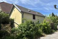 Zwei stark renovierungsbedürftige Häuser mit Garten und Garage in Mehrparteienhof in Rechnitz