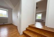 Exklusives Dachgeschoß-Juwel in historischem Gebäude mit großem Gartenanteil