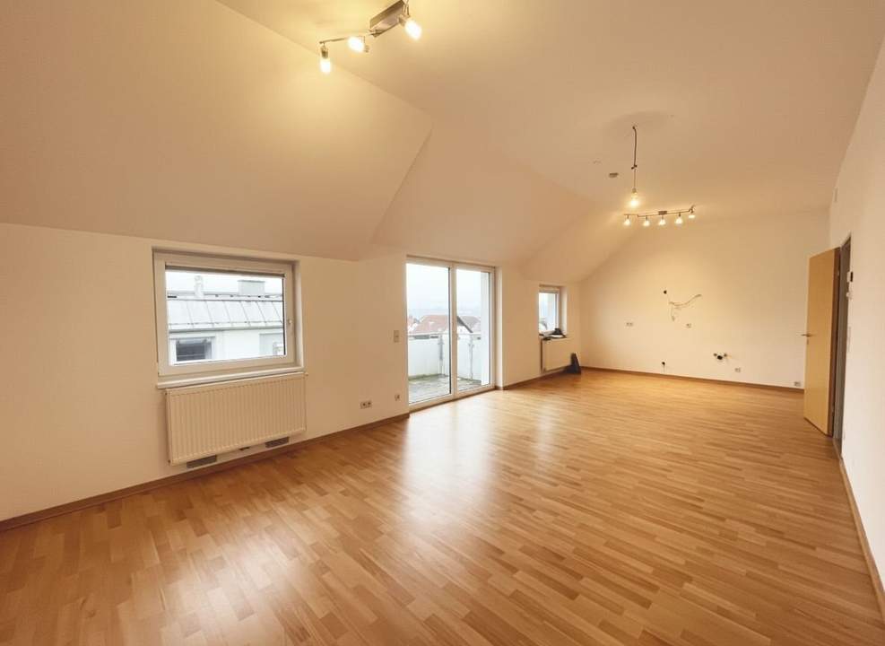 Charmante Dachgeschosswohnung mit 3 Zimmern & Balkon – Wohnen mit Weitblick