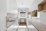 Rooftopterrasse von 73m2 mit top renovierter Wohnung, nahe Maurer Hauptplatz (mit Garage)