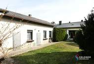 Solides Einfamilienhaus mit 3 Zimmer, Terrasse, großer Garten und 2 Garagen und Nebengebäude