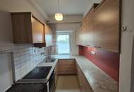 Mehrfamilienhaus mit Geschäftslokal