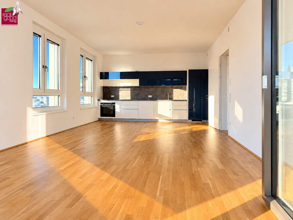 Familienwohnung mit Weitblick | 4 Zimmer, 20 m² Loggia, Spielplatz, Sauna & Outdoorküche
