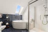 Wohnen über den Dächern von Graz mit Blick auf den Schlossberg: Exklusive Stadtwohnung mit Terrasse