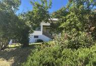 Wohnhaus mit Garage auf traumhaftem Grundstück am Waldrand mit herrlichem Ausblick zu verkaufen