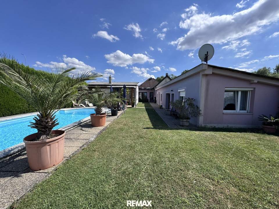 Attraktives Mehrfamilienhaus mit Garten, Terrasse, Pool &amp; Garage!