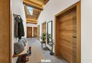 Mit dem Lift direkt in Ihr neues exklusives Penthouse mit Glaskamin und Traum Ausblick in Aurach bei Kitzbühel -