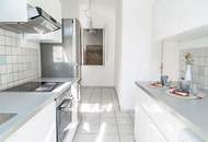 Altbau-Charme mit 3 Zimmern und Süd-Balkon in zentraler Lage
