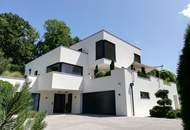 Moderne Luxusvilla mit Alpenchalet