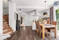 Zuhause im Grünen – Lichtdurchflutete Maisonette mit Gartenoase und Wasserblick