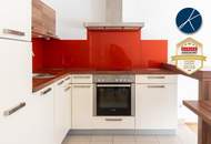 neuwertige 2-Zimmer-Wohnung mit Garten und Pkw-Stellplatz