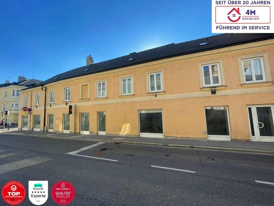 Mehrfamilienhaus mit Geschäftslokal und beh. genehmigter Aufstockung