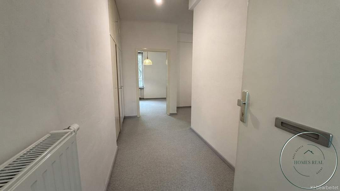 Geschütztes Refugium mit Blick ins Hof-Grün: Großzügige 3,5-Zimmer-Wohnung mit Balkon & Gestaltungsfreiraum