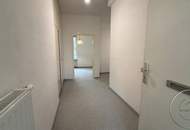 Geschütztes Refugium mit Blick ins Hof-Grün: Großzügige 3,5-Zimmer-Wohnung mit Balkon & Gestaltungsfreiraum