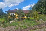 BAUMEISTERBUNGALOW IN FABELHAFTER WALDRANDLAGE