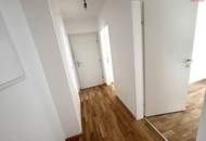 Moderner Rückzugsort für Familien & Naturfans: helle Wohnküche, 3 Schlafzimmer und ein hochwertiges Bad vereinen Komfort, Stil und urbanes Lebensgefühl auf kompaktem Raum!