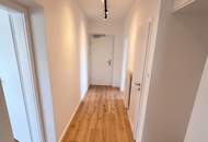 Erstbezug nach Generalsanierung: Stylischer 3-Zimmer-Wohntraum mit Balkon & Fernblick